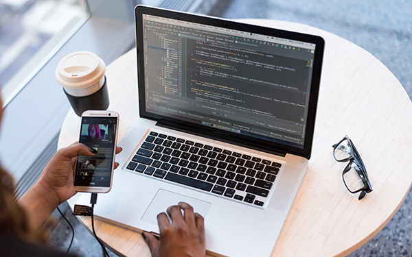 job search hands using laptop